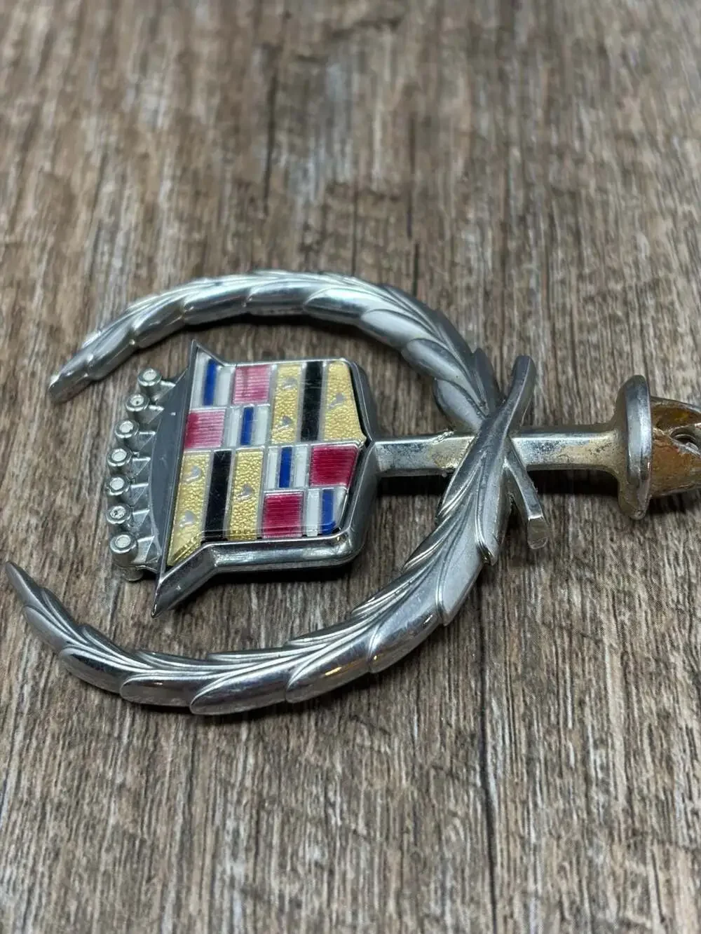Vintage Iconic GM Cadillac crest and wreath hood ornament emblem with gold birds